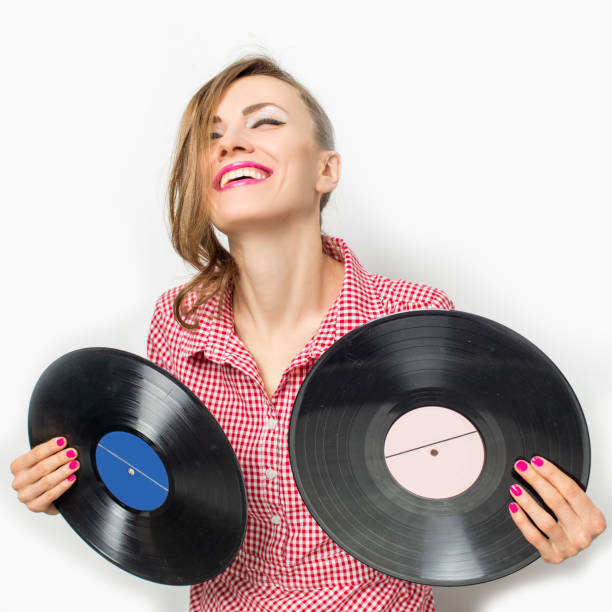 istock Woman with vinyl record 902148612