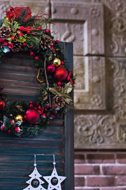 istock Christmas composition, Christmas wreath in the interior. 902150158