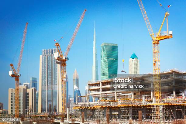 Construction Of New Buildings In Dubai Stock Photo - Download Image Now - Construction Site, Dubai, Construction Industry