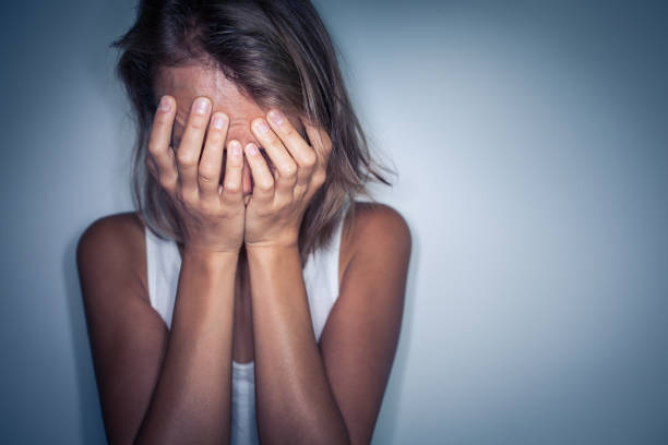 istock Young woman suffering from a severe depression 902156364