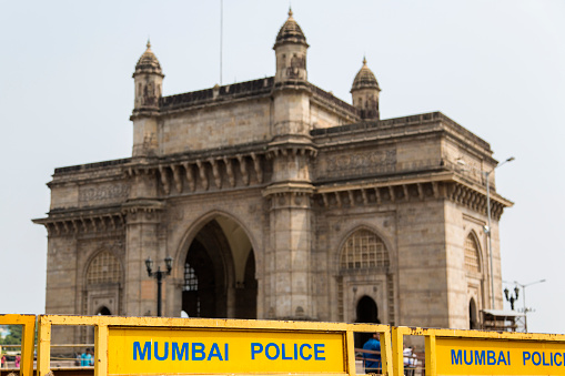 Mumbai police signage in front of the Gateway of India in Mumbai