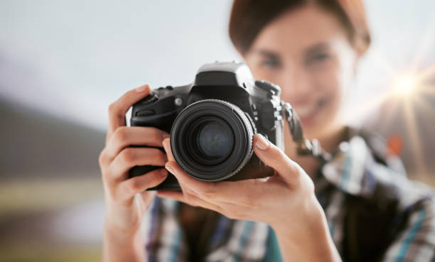 istock Photographer shooting outdoors 902167130