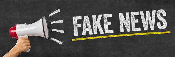 istock Man holding a megaphone - Fake News 902167328