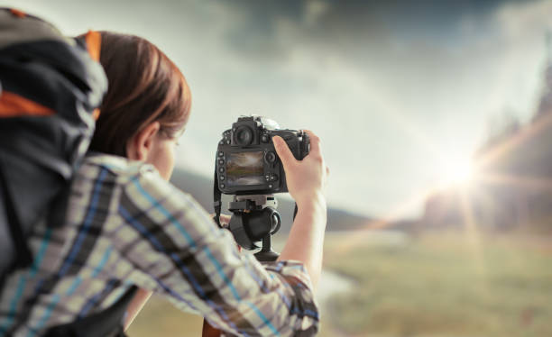 istock Photographer shooting outdoors 902168284