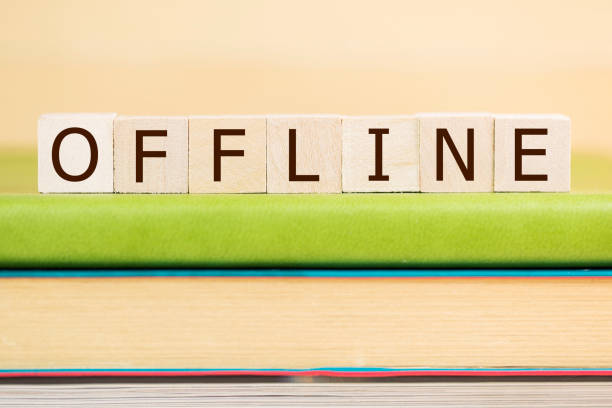 istock Offline word built with letter cubes on green book 902168806
