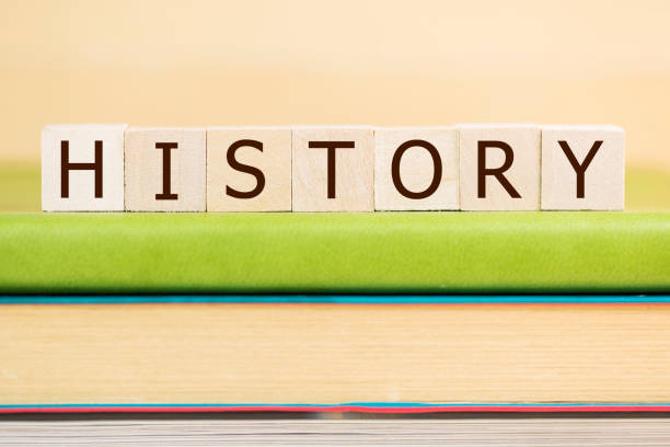 istock History word built with letter cubes on green book 902171424