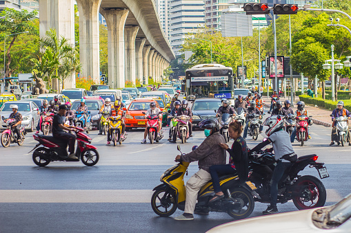 Bangkok, Thailand - February 21, 2017: Heavily traffic jam at Thai-Japanese bridge junction nearby Sala Daeng, Silom Road and Lumpini park area in Bangkok, Thailand.