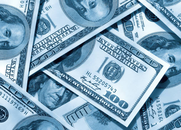 istock Money background from dollars usa 902184230