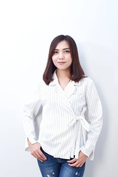 istock young asian woman posing 902192360