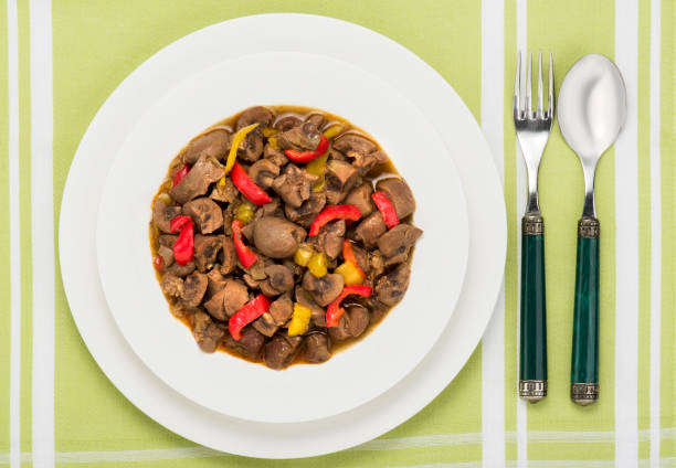 Cooked of kidney saute (offal) food on dinner table. Turkish culture.