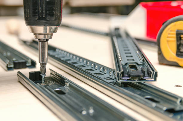 istock Assembling of furniture closeup 902202652