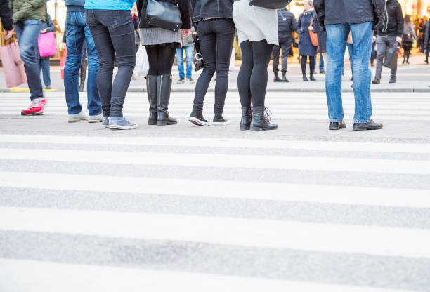 istock Crowd people crossing street, motion blur 902202912