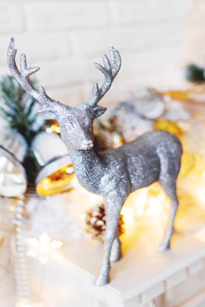 istock Christmas and New Year decorations with silver deer. Holiday winter background. 902204010