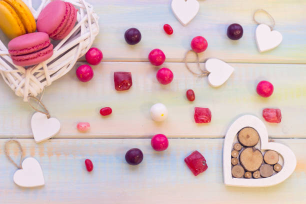 istock Woven heart with macaroons and candies 902210502