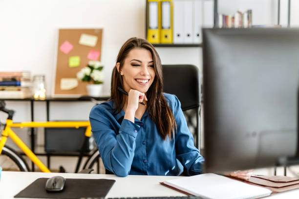 istock Businesswoman in the office working hard 902212606