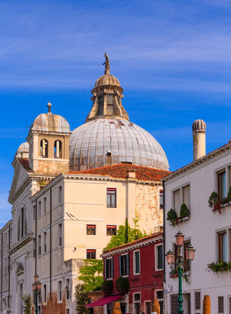 istock Church Dome Beyond Old Venice Buildings 902212690