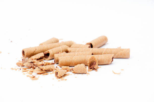 chopped rolled wafer filled with chocolate fudge on white background,image of a