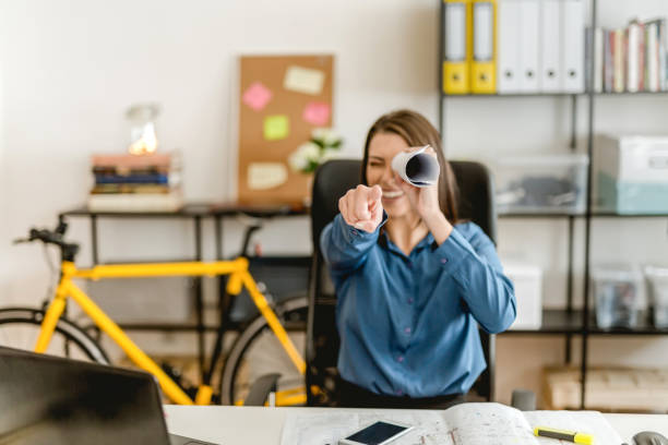 istock Woman searching trough hand made binocular 902214812