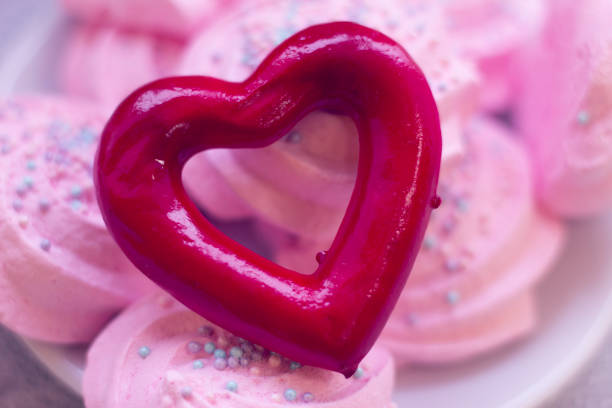 istock Pink marshmallows and red heart 902217626