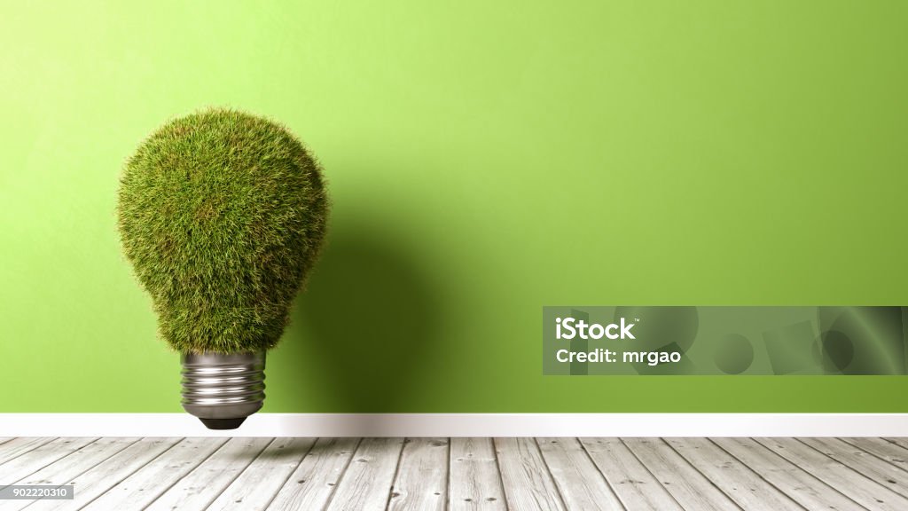 Ampoule herbeux sur plancher en bois - Photo de Efficacité énergétique libre de droits