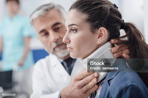 Doctor Visiting A Patient With Cervical Collar Stock Photo - Download Image Now - Physical Injury, Neck Brace, Misfortune