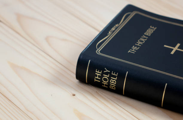 istock holy bible on wood table 902227550