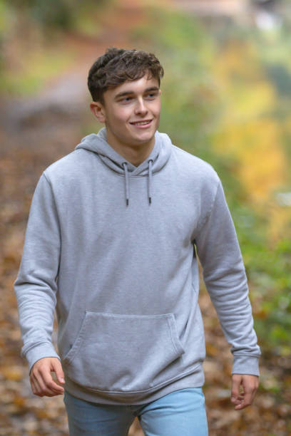 istock Young adult walking outside 902227962