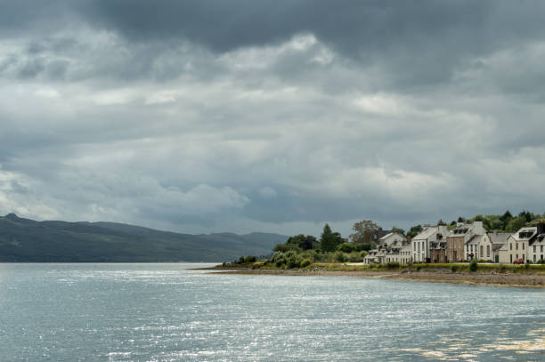 Loch Fyne, Scotland Moody sky over Loch Fyne in Western Scotland. A small part of the village of Inveraray is visible. loch fyne stock pictures, royalty-free photos & images