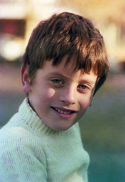 istock Boy portrait from the seventies outdoors 902242534