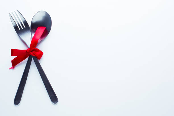 istock Valentine's day concept fork and spoon indicating a dinner seen from above. 902248534