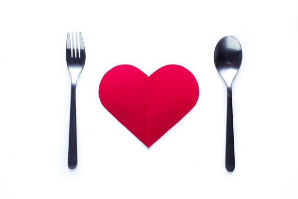 istock Valentine's day concept fork and spoon indicating a dinner seen from above. 902250852