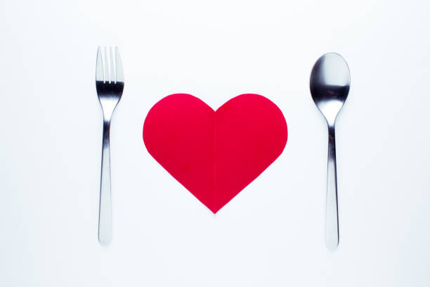istock Valentine's day concept fork and spoon indicating a dinner seen from above. 902250976