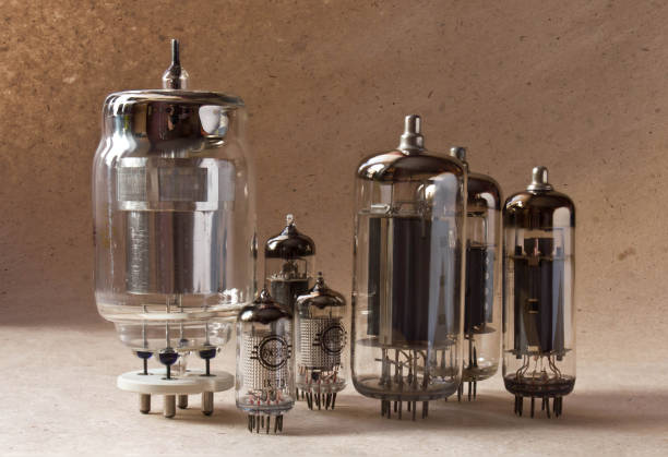 istock electronic vacuum tubes on kraft paper background in warm colours. 902251792