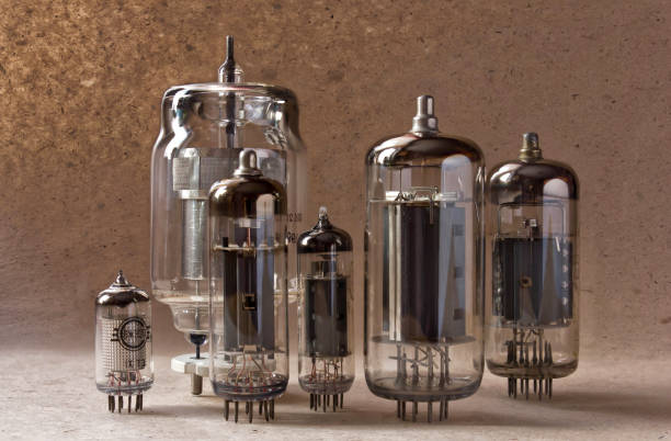 istock electronic background with vacuum tubes on kraft paper. 902251822