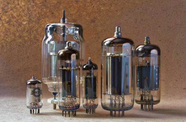 istock electronic background with different tipes vacuum tubes on kraft paper. 902251840