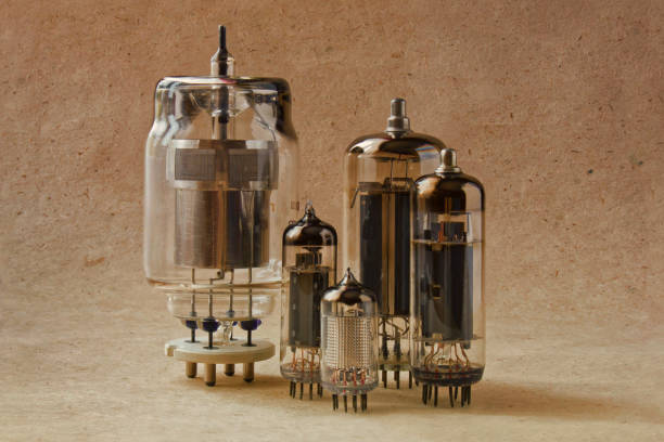 istock horizontal composition of different electronic vacuum tubes in warm colors. 902251878