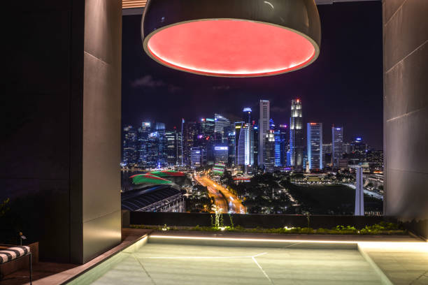 Skyline Singapore Skyline of Singapore licht stock pictures, royalty-free photos & images
