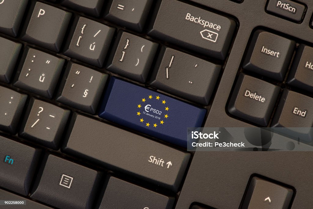 Payment Services Directive 2 (PSD2) Payment Services Directive 2 (PSD2) on keyboard button Paying Stock Photo