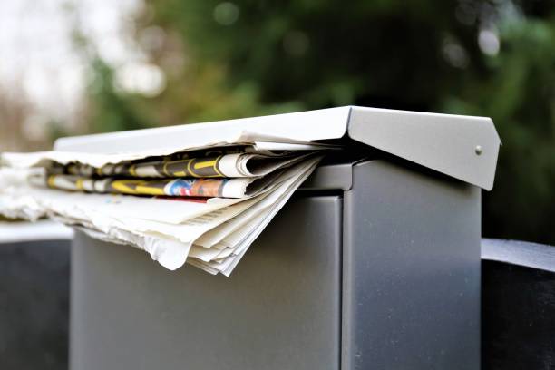 istock An concept Image of a Mailbox with a newspaper 902258208