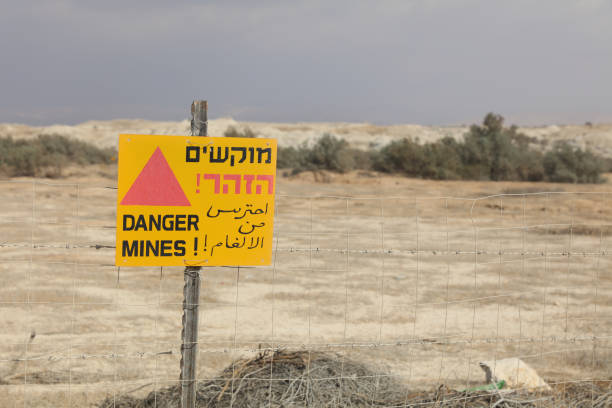 istock Minefield Warning Sign at Golan Heights between Syria and Israel 902260626
