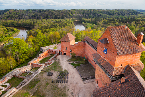 Sigulda, Latvia - May 8, 2014: view from tower on Turaida castle and Gauya river.