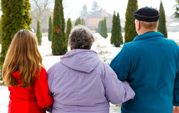 istock Elderly couple and young caregiver 902267914