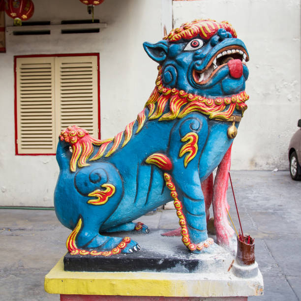 istock Chinese welcoming lion sculpture 902275998