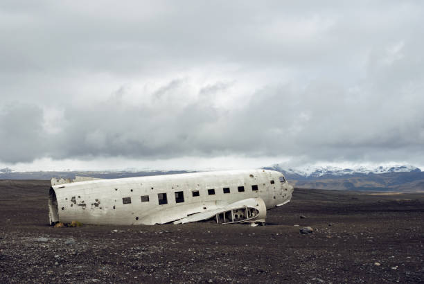 istock Crashed military plane in black sand Solheimasandur beach 902279614