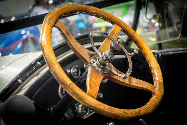 istock Old wooden car steering wheel 902279800