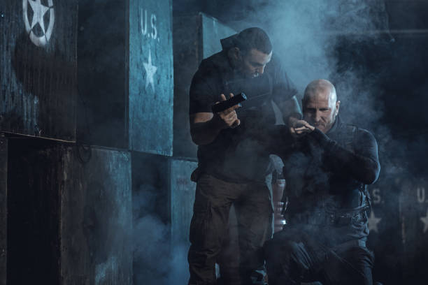 istock Krav Maga fighting duo training in dark indoor urban setting 902280126