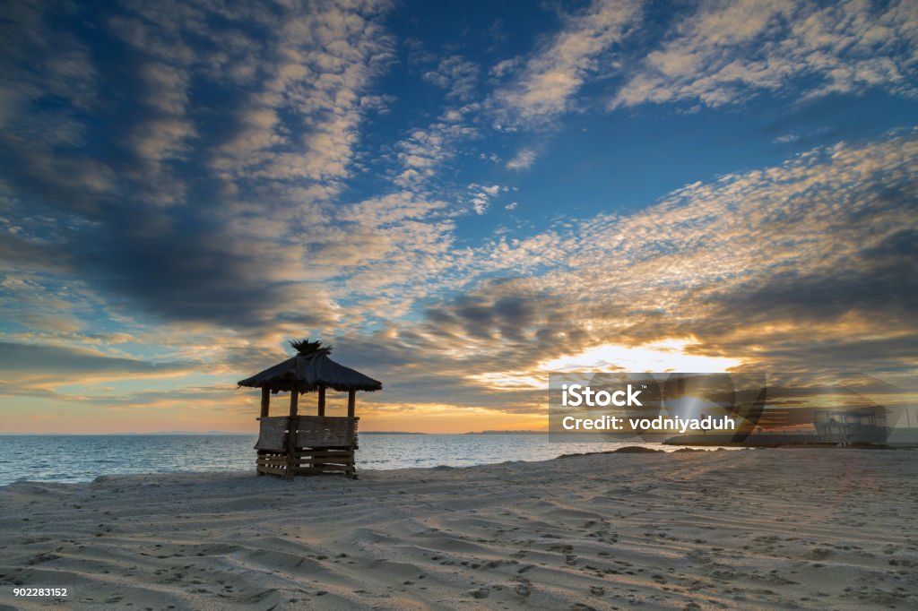 Beautiful sunset on the empty beach Beautiful empty beach at sunset Bay of Water Stock Photo