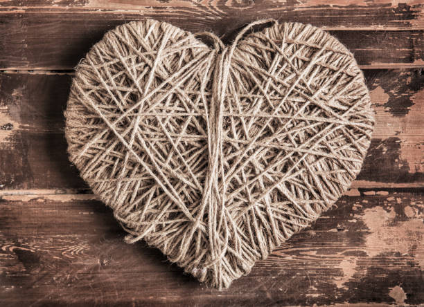 istock heart symbol wound with rope 902290342