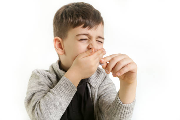 istock Young boy doesn't want to take a medicine 902293930