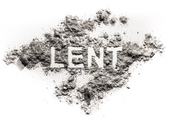 Lent word written in ash, dust Lent word written in ash, dust as fast and abstinence period concept, Jesus Christ, faith, christian, religion background lent stock pictures, royalty-free photos & images